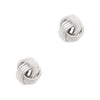 Pair of silver knot earrings on a white background