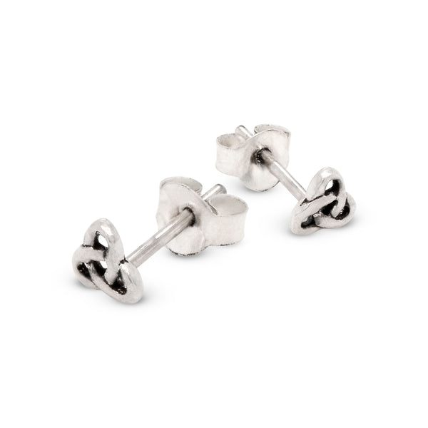 Pair of silver Celtic knot stud earrings on a white background