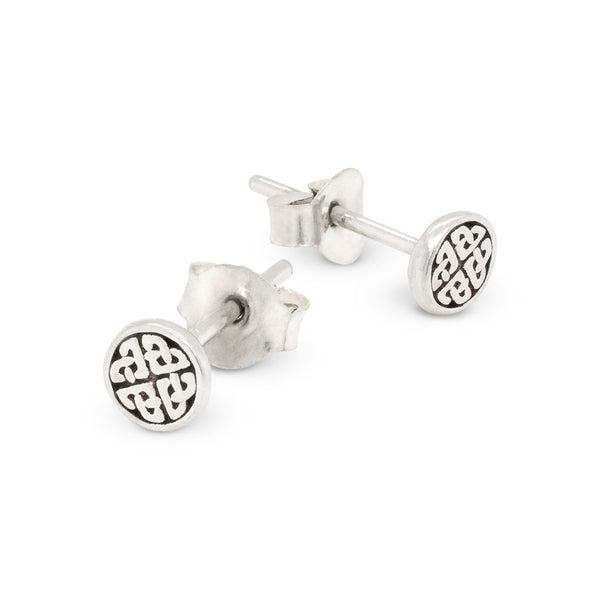 Pair of silver stud earrings with a Celtic knot design on a white background