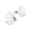 Silver flower-shaped stud earrings on a white background