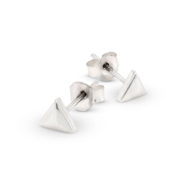 Pair of silver triangle stud earrings on a white background