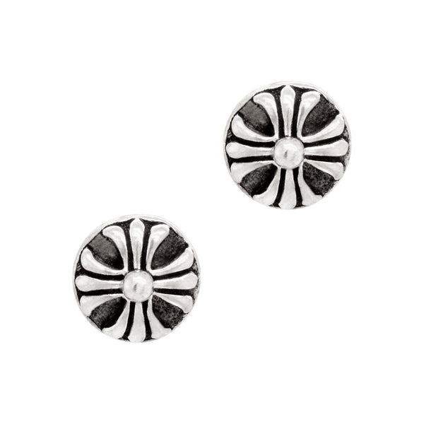 Pair of silver floral earrings on a white background