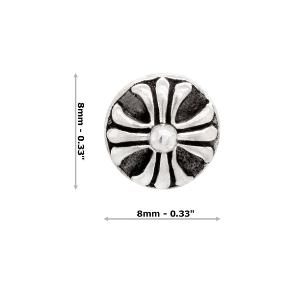 Silver metal earring with measurements on a white background