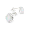 Silver earrings with iridescent stones on a white background
