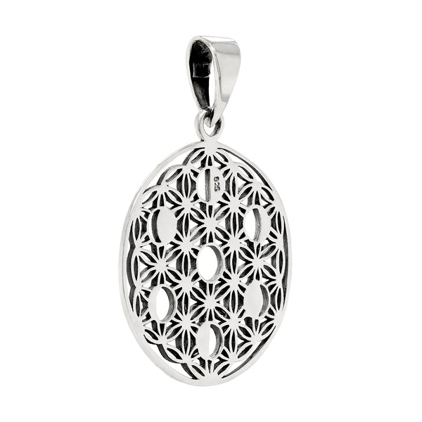 Silver pendant with intricate cut-out design on a white background